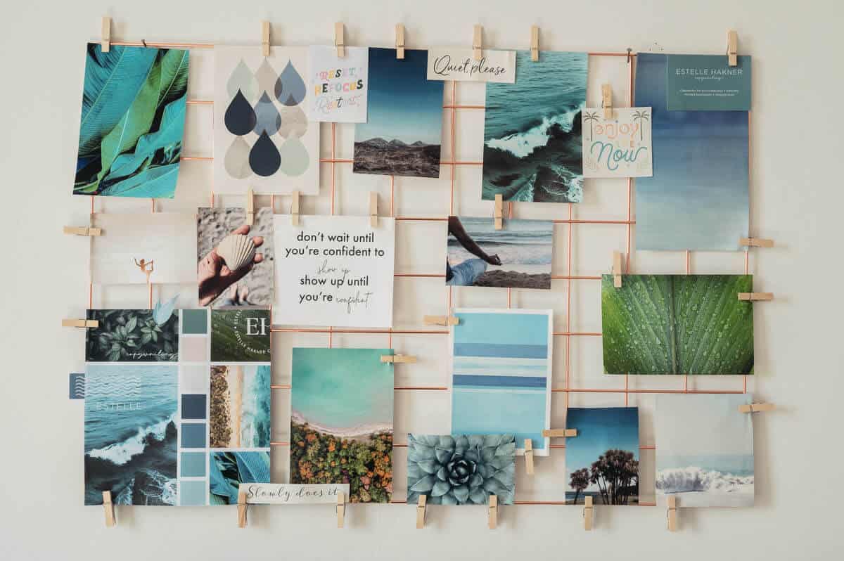 A mood board with various photos attached of yoga, plants and the ocean